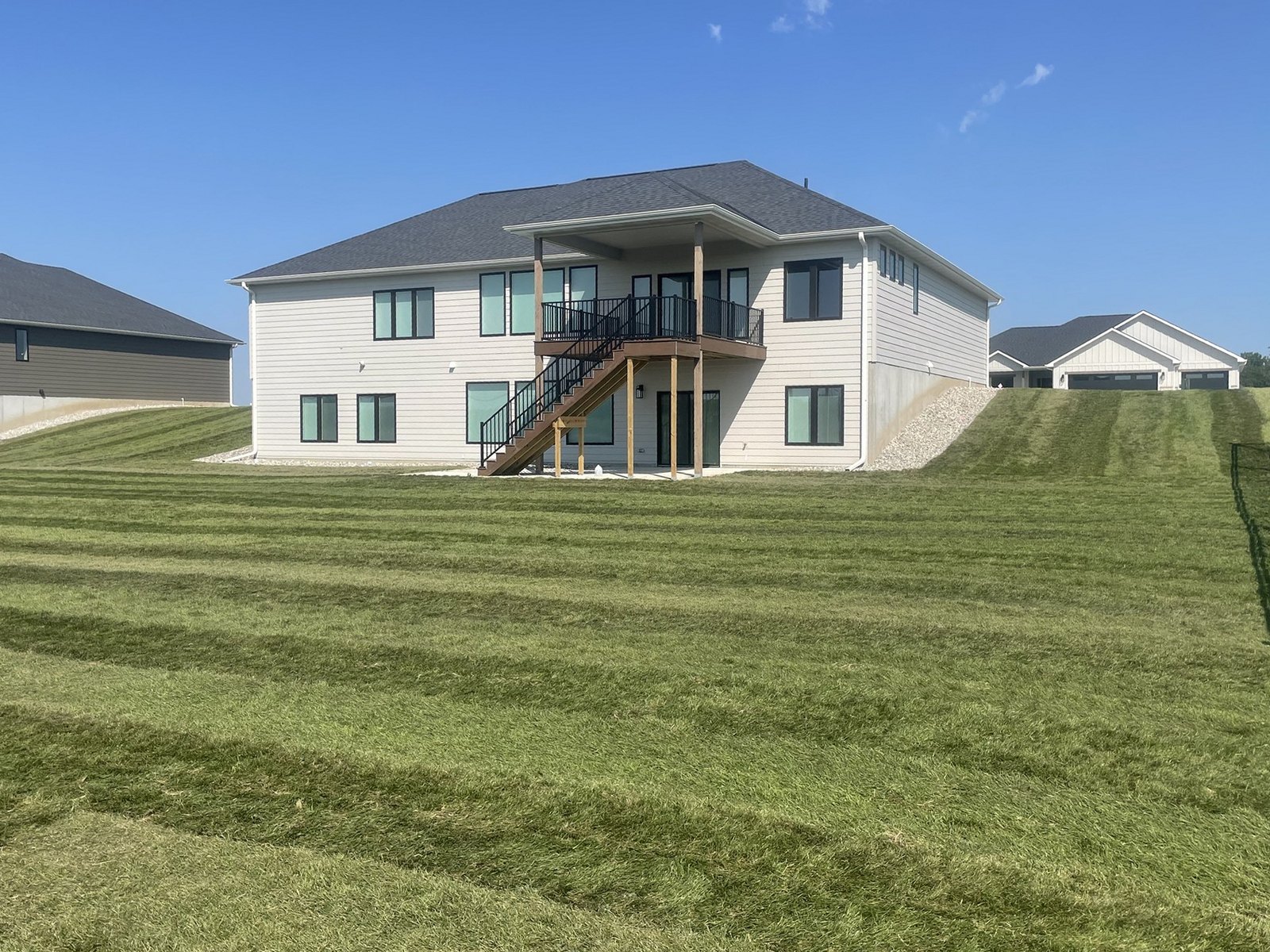Finished sodded lawn on a graded slope
